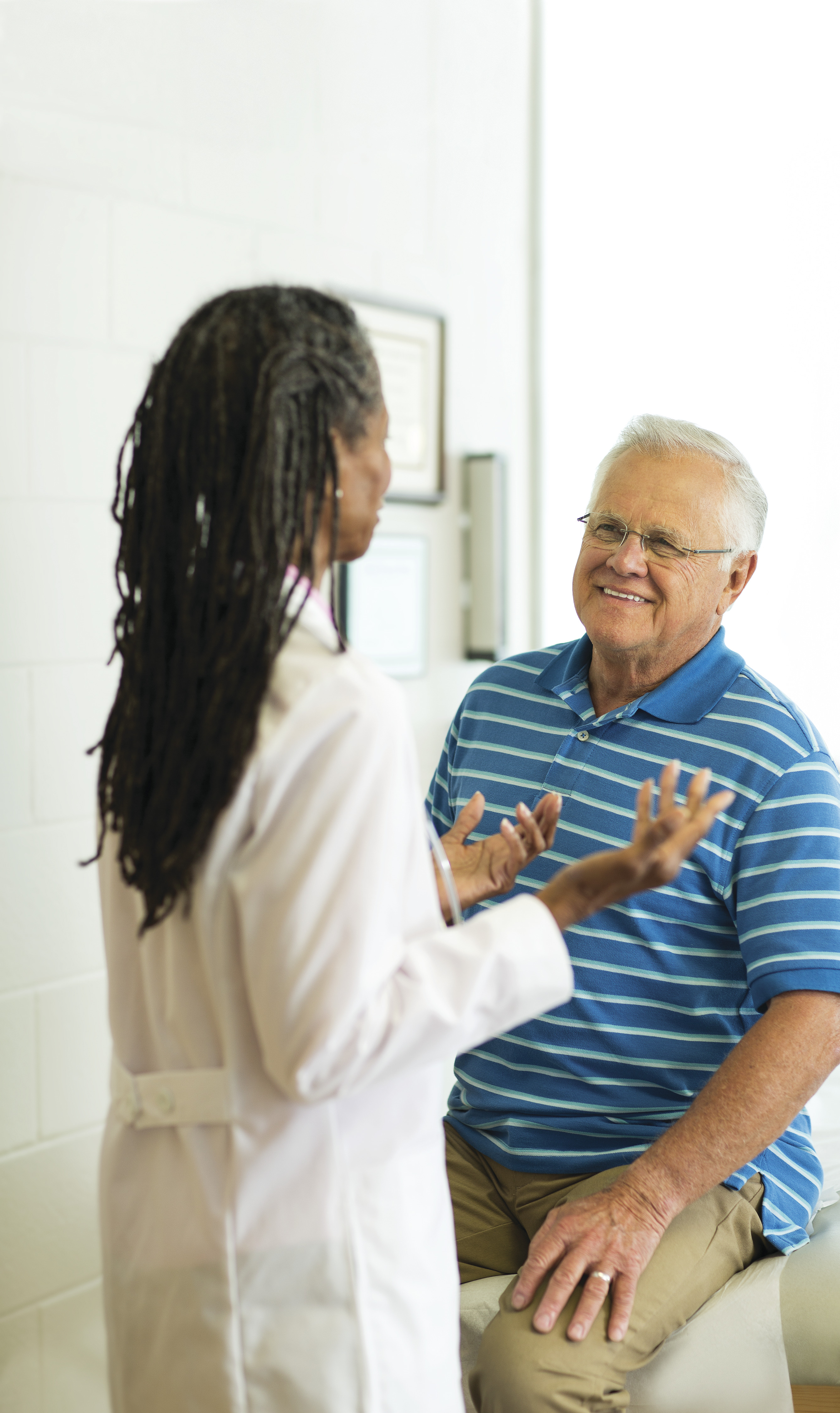 Doctor talking to patient - YMCA