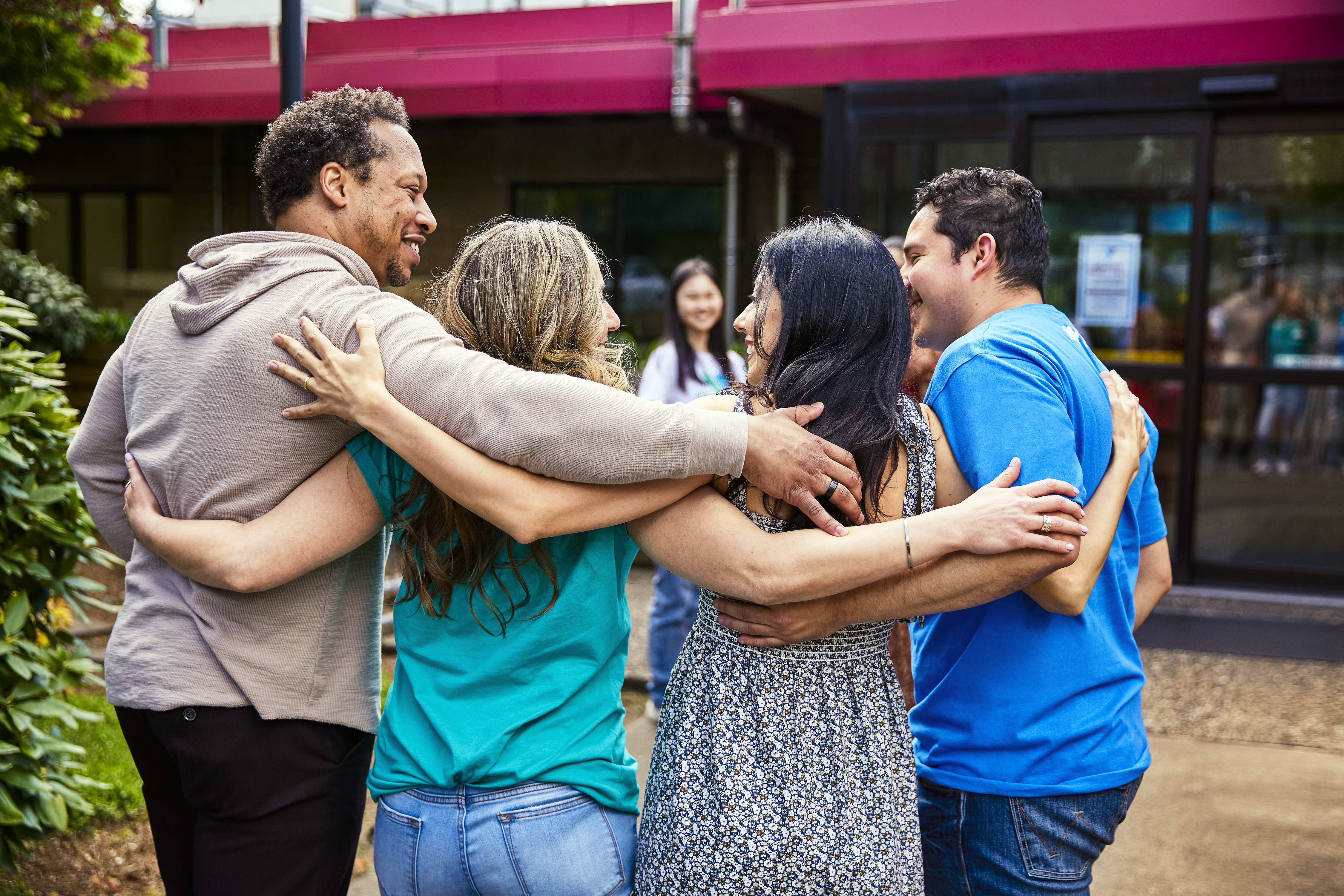 Group of adults work together