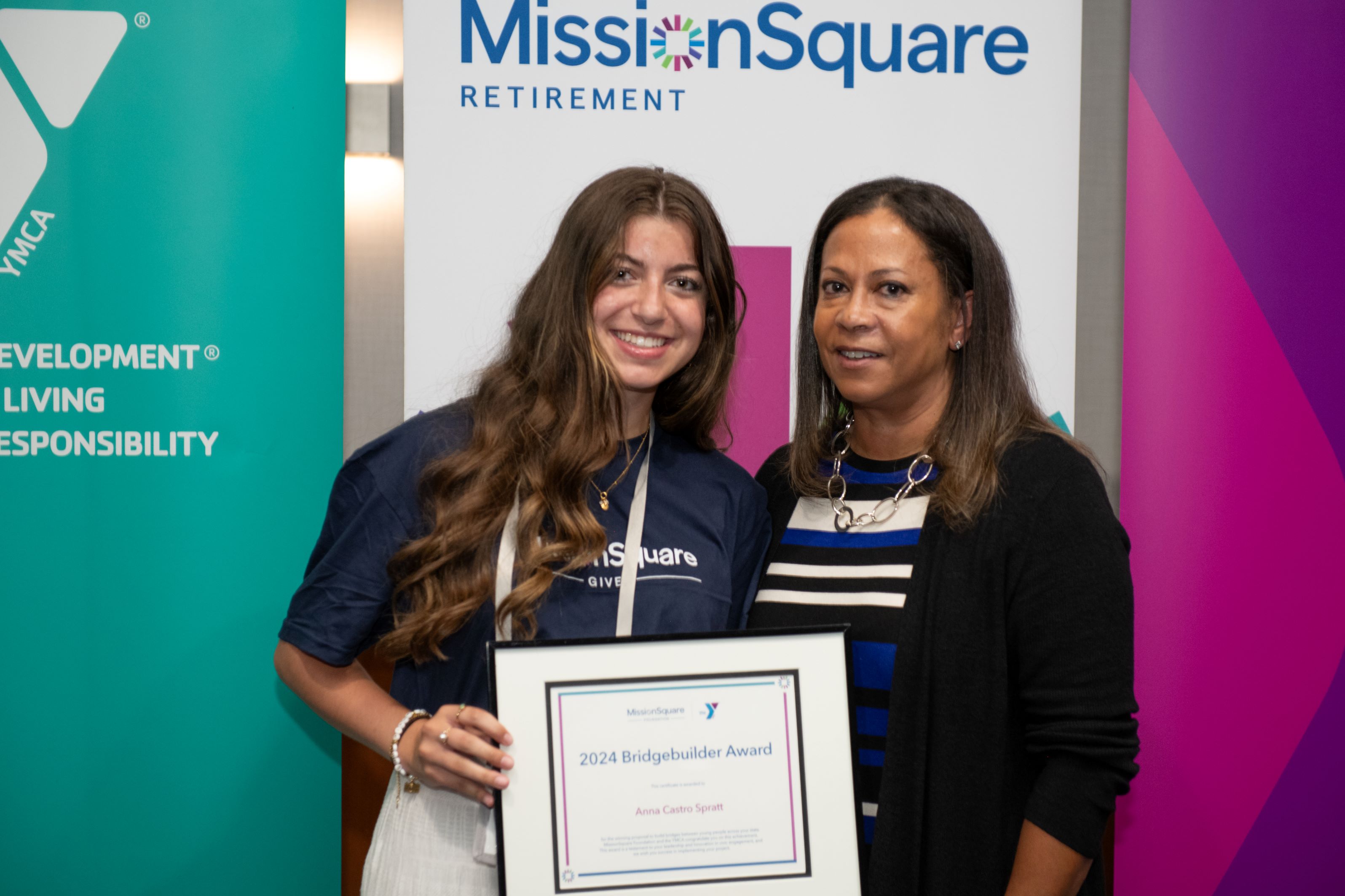 Angela Montez, Chief Legal, Corporate & Government Affairs Officer of MissionSquare Retirement presents the 2024 MissionSquare Bridgebuilder Award to Anna Castro Spratt of South Carolina.